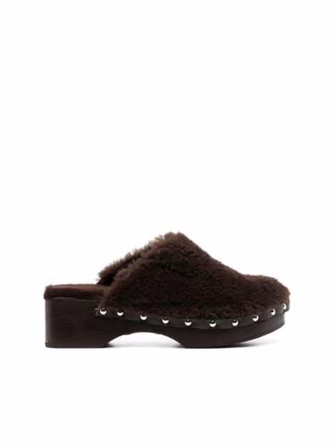 closed sheepskin clogs
