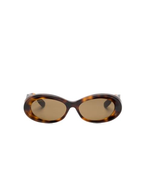 tortoiseshell oval-frame sunglasses