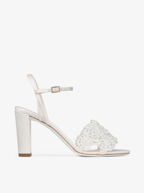 Cary 85
Ivory Satin Block Heel Sandal with Pearl Embellishments