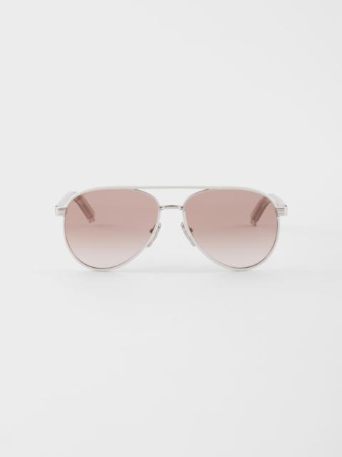 Prada sunglasses with the iconic metal plaque