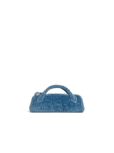 LE TECKEL CLUTCH IN SHAVED SHEARLING