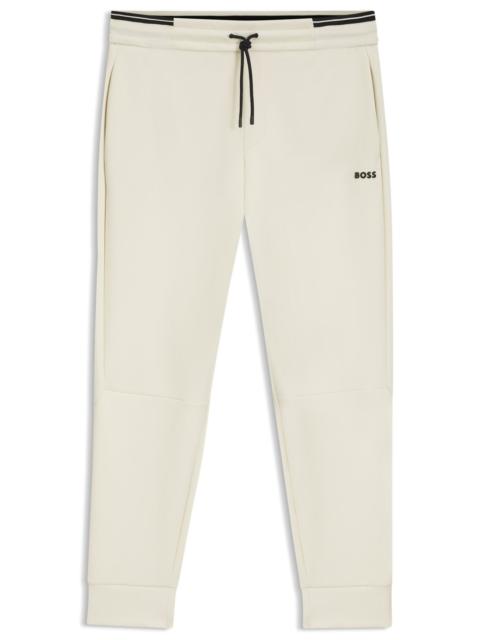 COTTON TRACKSUIT BOTTOMS WITH STRIPED TRIMS