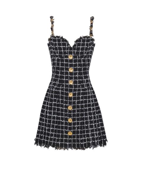 Tweed dress with chain straps