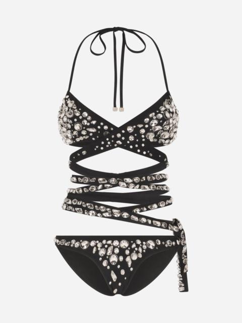 Bikini with crossover lacing and rhinestone appliqués