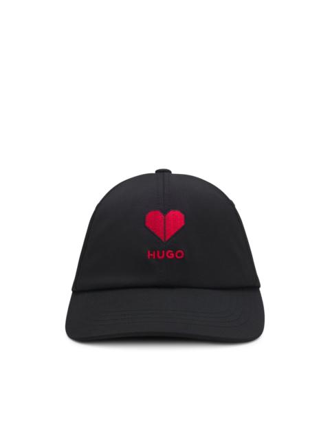 heart-embroidered logo cap