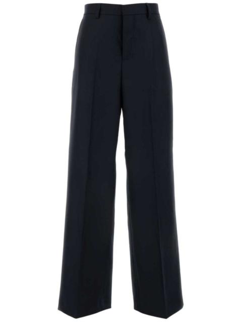 high-waisted wool trousers