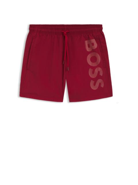 SWIM SHORTS WITH VERTICAL LOGO PRINT