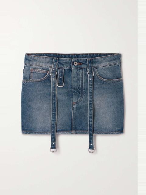 Distressed denim mini skirt