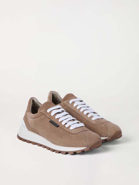 Suede runners with shiny tab