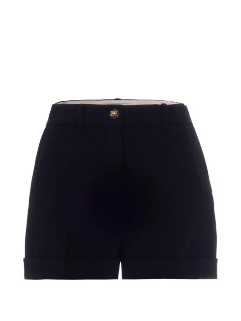 button-fastening shorts