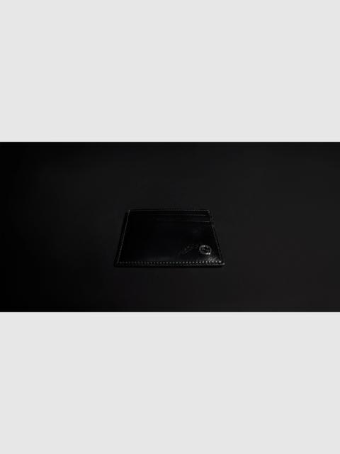 Card case with Interlocking G
