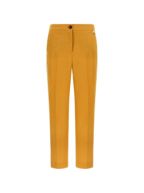 pleated linen trousers