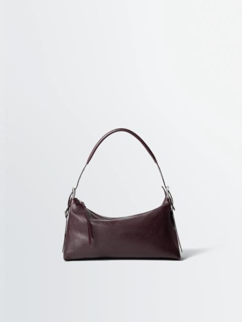 BELTED BAGUETTE BAG IN LEATHER
