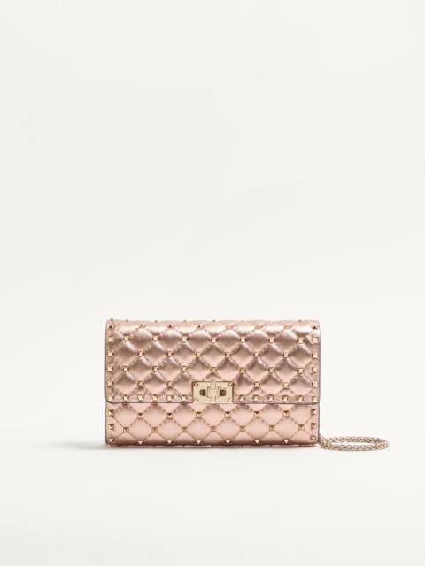VALENTINO GARAVANI ROCKSTUD SPIKE SHOULDER BAG IN LAMINATED NAPPA LEATHER