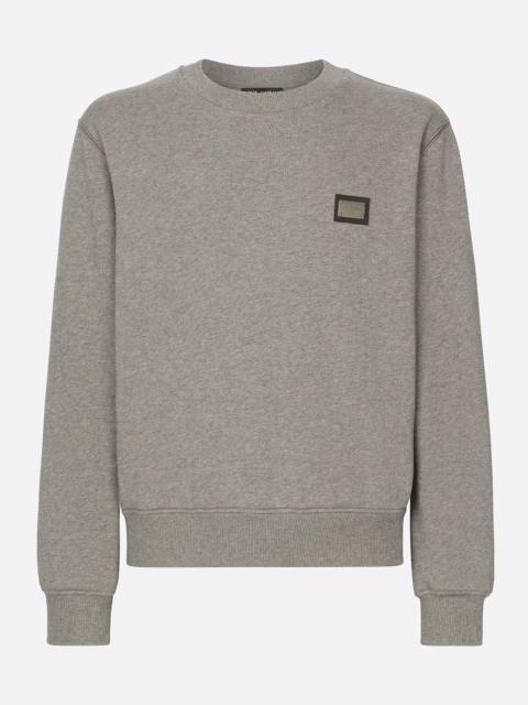 Jersey sweatshirt with branded tag