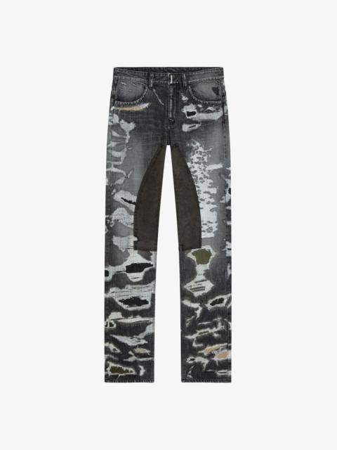 JEANS IN DESTROYED DENIM AND MOLESKIN