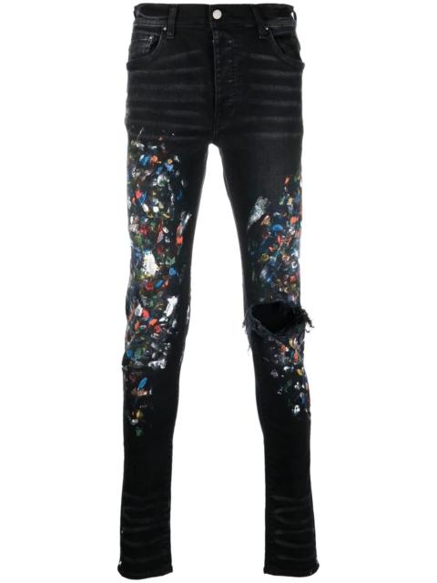 paint print distressed skinny jeans