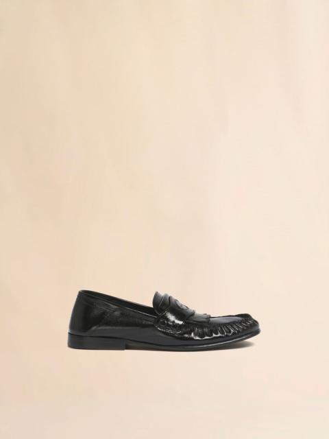 BLACK LEATHER TASSEL LOAFER WITH COLLAPSIBLE HEEL
