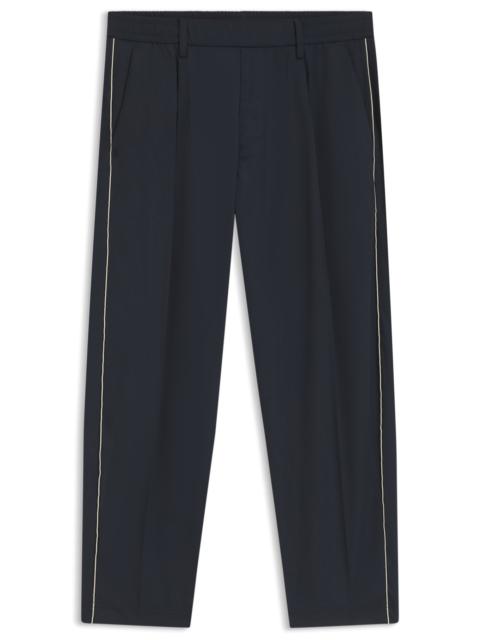 TAPERED-FIT TROUSERS WITH WATER-REPELLENT FINISH
