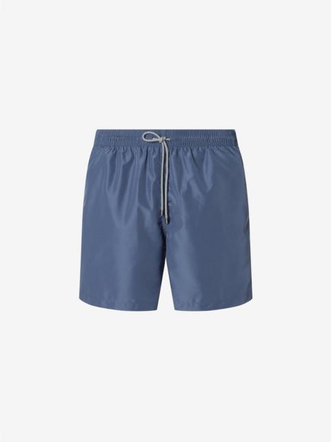 Short blue swimming trunks