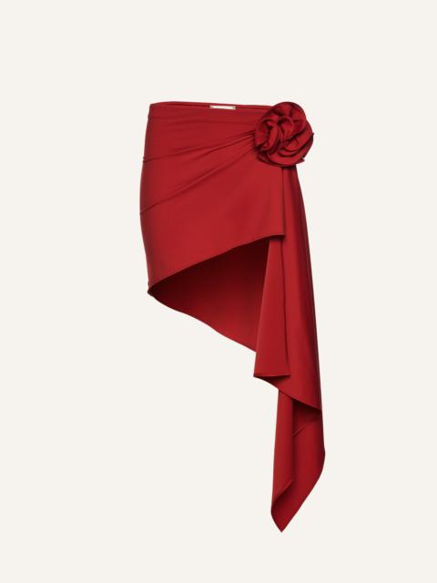 Asymmetrical draped swim skirt in red