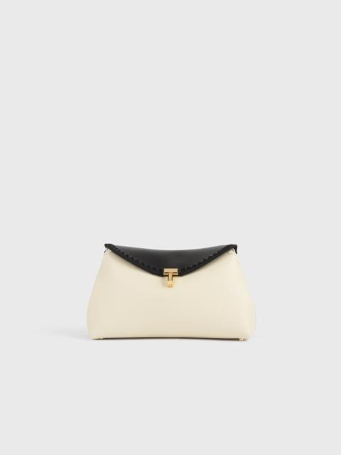 T-lock embroidered leather clutch black/milk