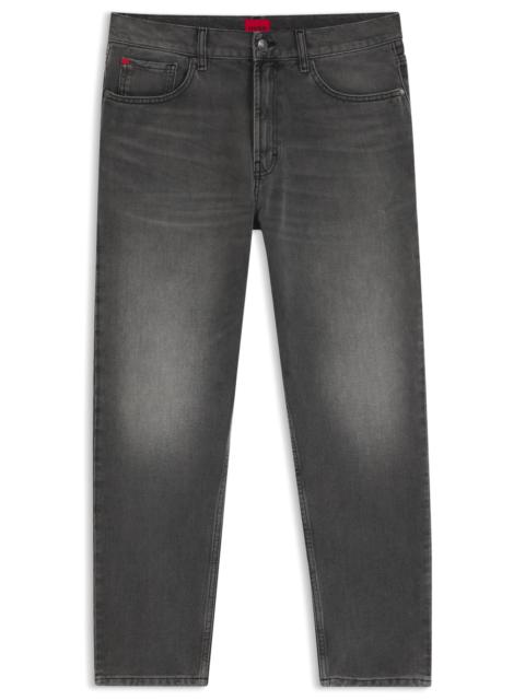TAPERED-FIT JEANS IN GRAY DENIM WITH USED EFFECTS