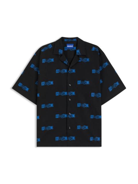 RELAXED-FIT SHORTS IN PRINTED COTTON POPLIN