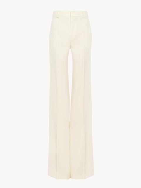 HIGH-RISE FLARED PANTS IN WOOL GRAIN DE POUDRE