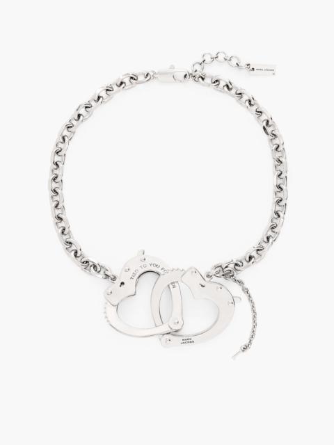 THE HEART HANDCUFF NECKLACE
