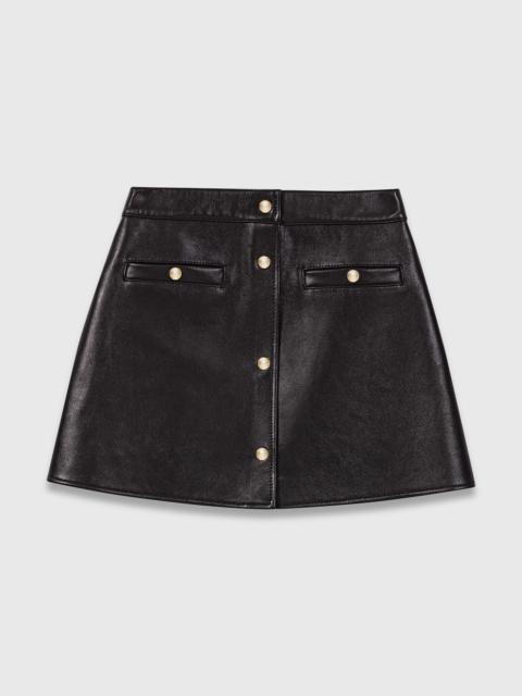 Short leather skirt