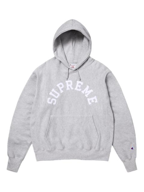 x Champion® logo-print hoodie