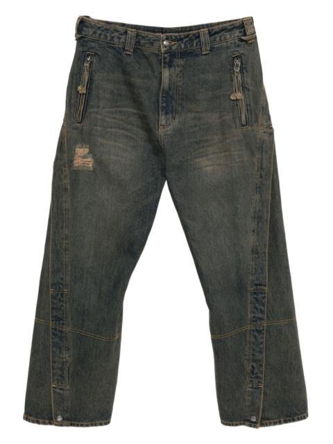 twisted zipped-pockets jeans