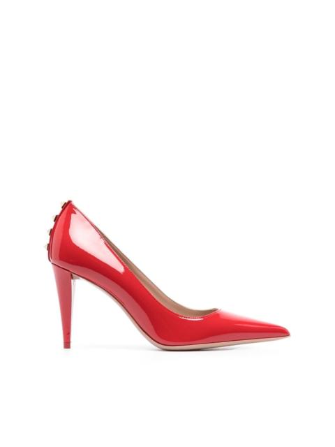 Rockstud patent-leather pumps