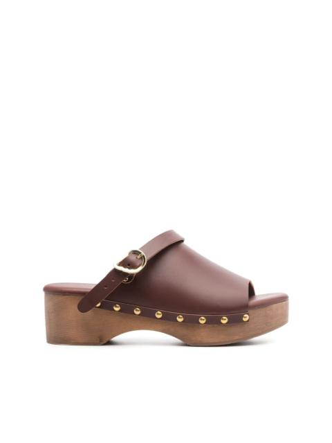 buckled leather clogs