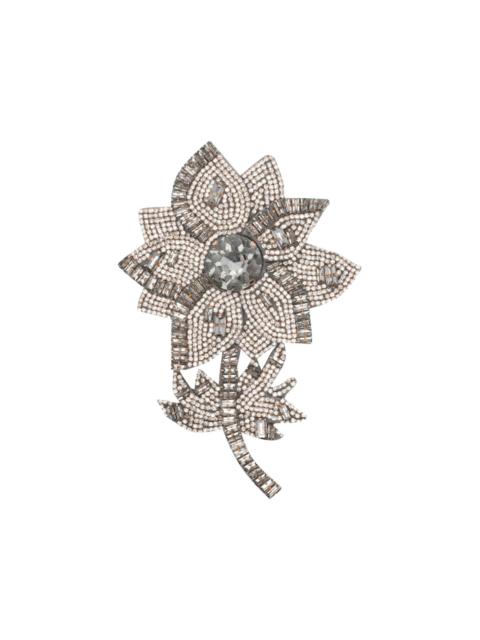 flower-shaped rhinestone brooch