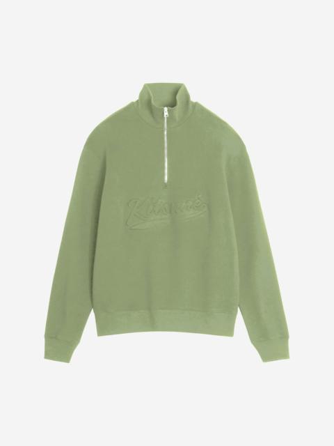 VARSITY HALF ZIP COMFORT SWEATER