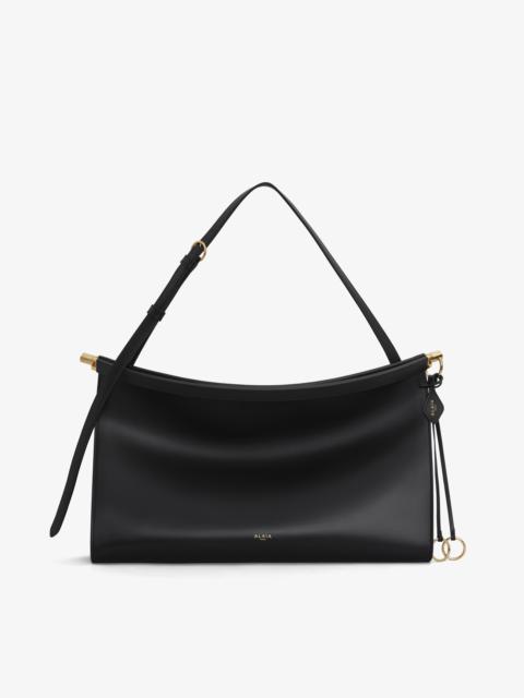 LE CLICK EAST WEST LARGE BAG IN LEATHER