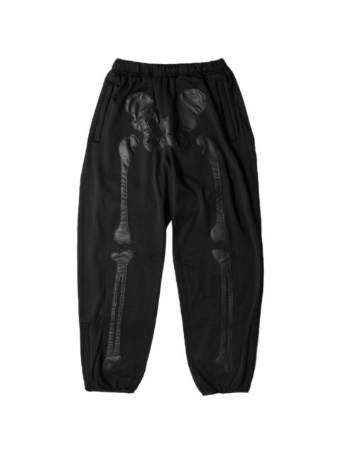 bone-motif track pants