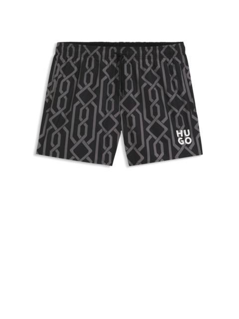 SWIM SHORTS WITH ALL-OVER PRINT