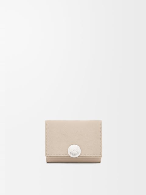 Pebble trifold wallet in pebble grain calfskin