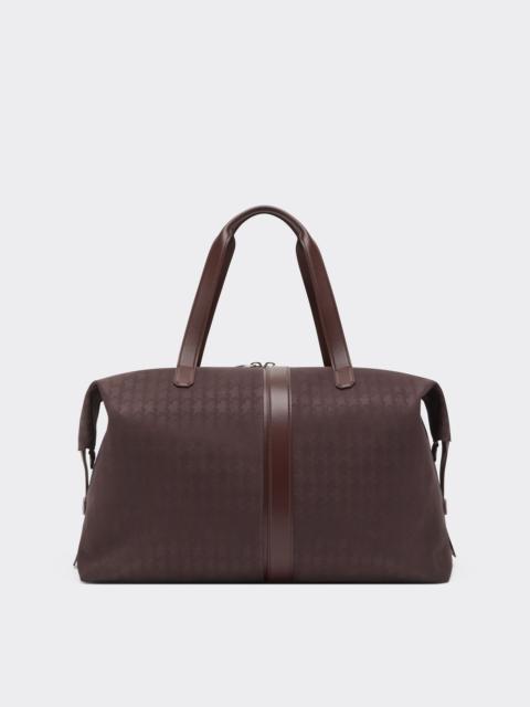 Q-Cycle® jacquard duffle bag with Cavallino pattern