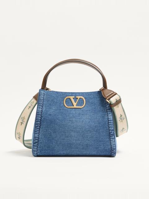 VALENTINO GARAVANI ALLTIME MEDIUM HANDBAG IN DENIM WITH EMBROIDERED STRAP