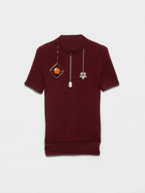 Short-sleeved wool sweater with pendants