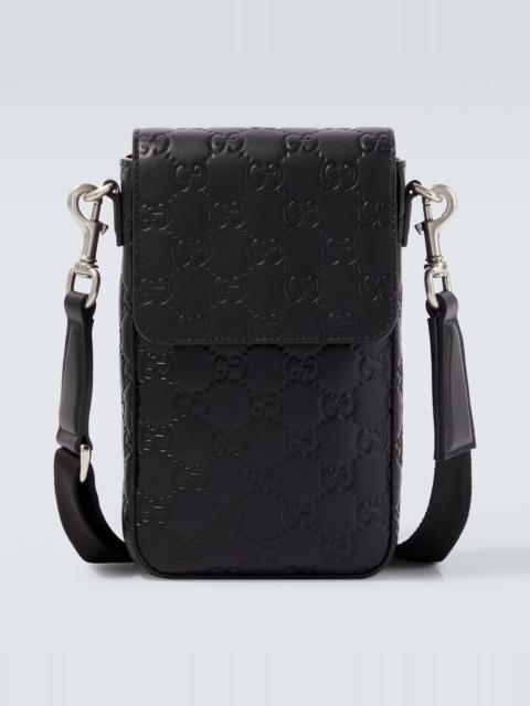 GG Emblem debossed leather phone pouch