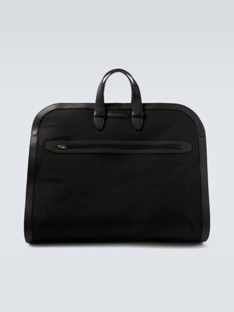 Leather-trimmed garment bag