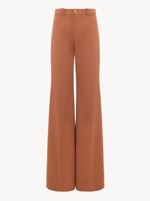 HIGH-RISE FLARED PANTS IN COTTON CANVAS