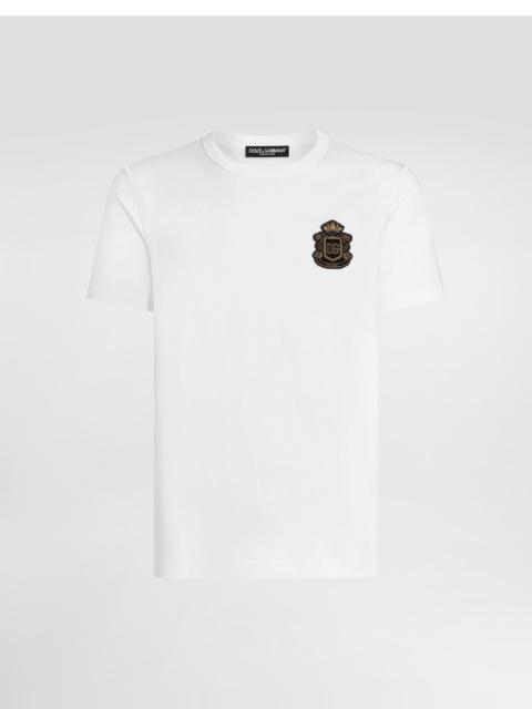 T-shirt with heraldic patch