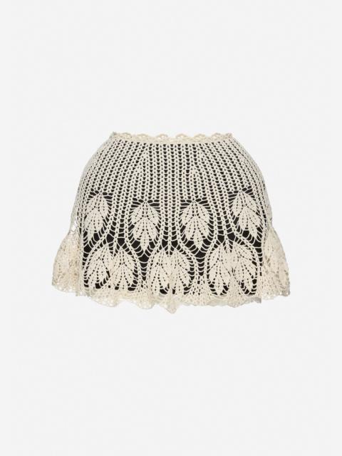 Mini skirt with crochet overlay in cream