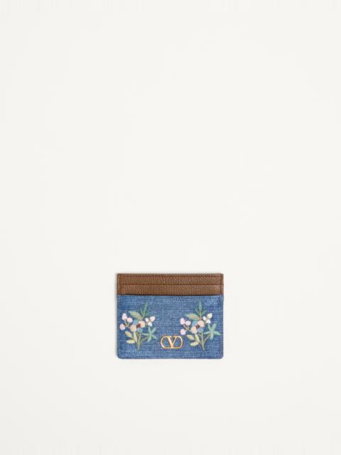 VALENTINO GARAVANI VLOGO SIGNATURE CARD HOLDER IN DENIM WITH FLORAL EMBROIDERY